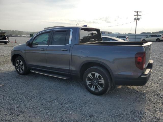Photo 2 from auction – 2020 HONDA RIDGELINE RTL with VIN 5FPYK3F56LB010630