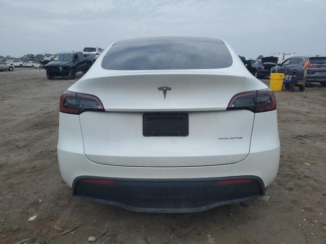 Photo 6 from auction – 2023 TESLA MODEL Y with VIN 7SAYGAEE4PF693730