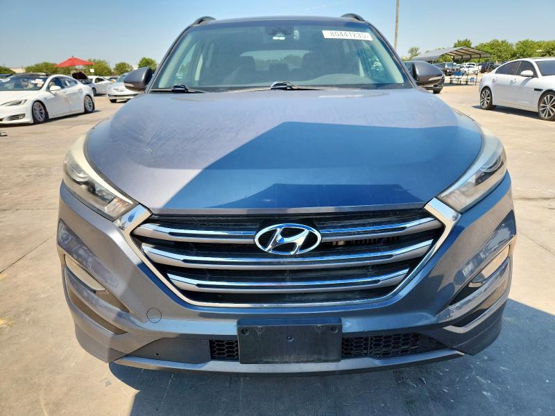 Photo 5 from auction – 2016 HYUNDAI TUCSON LIM with VIN KM8J33A28GU056716