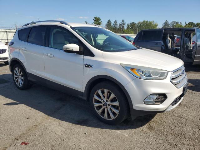 Photo 4 from auction – 2017 FORD ESCAPE TITANIUM with VIN 1FMCU9JD4HUC58075