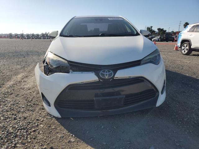 Photo 5 from auction – 2017 TOYOTA COROLLA L with VIN 5YFBURHE5HP652485