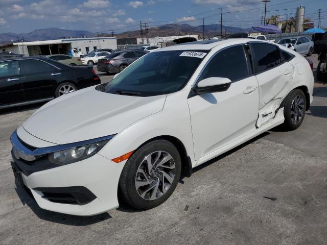 HONDA CIVIC EX 2017 with VIN 2HGFC2F75HH573633 - Photo from auction