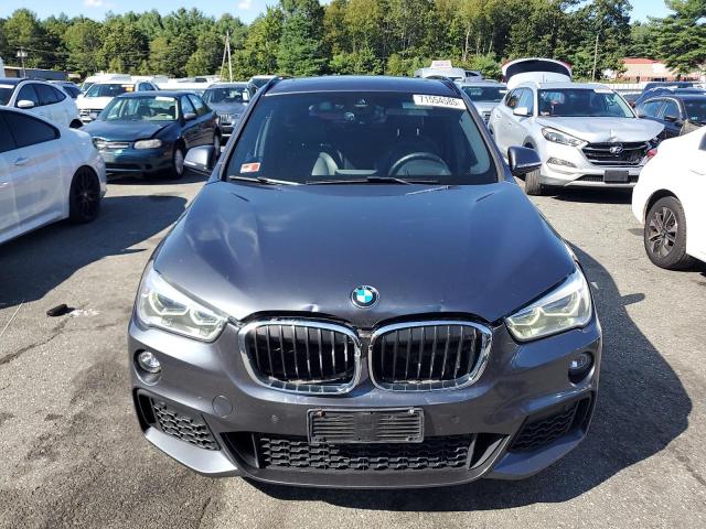 Photo 5 from auction – 2018 BMW X1 XDRIVE2 with VIN WBXHT3C31J5K23673