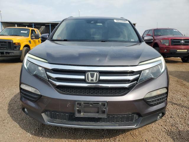 Photo 5 from auction – 2017 HONDA PILOT TOURING with VIN 5FNYF6H91HB019838
