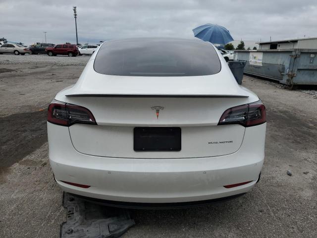 Photo 6 from auction – 2021 TESLA MODEL 3 with VIN 5YJ3E1EB6MF035437