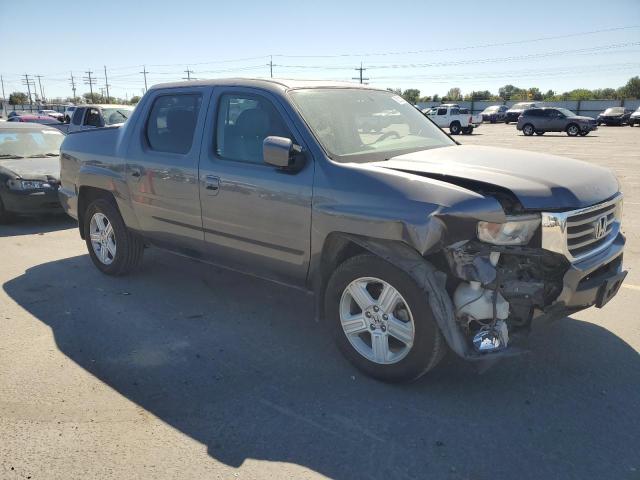 Photo 4 from auction – 2014 HONDA RIDGELINE RTL with VIN 5FPYK1F57EB005668