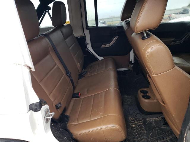 Photo 11 from auction – 2011 JEEP WRANGLER U with VIN 1J4BA3H18BL634608