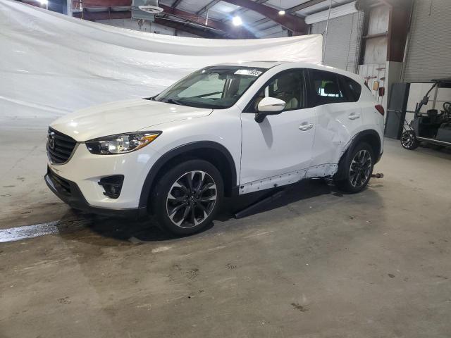 MAZDA CX-5 GT 2016 with VIN JM3KE4DY2G0706342 - Photo from auction