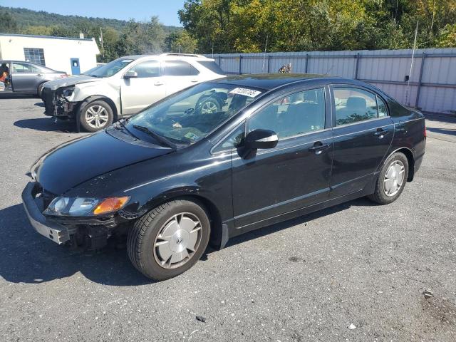 HONDA CIVIC HYBR 2011 with VIN JHMFA3F28BS000352 - Photo from auction