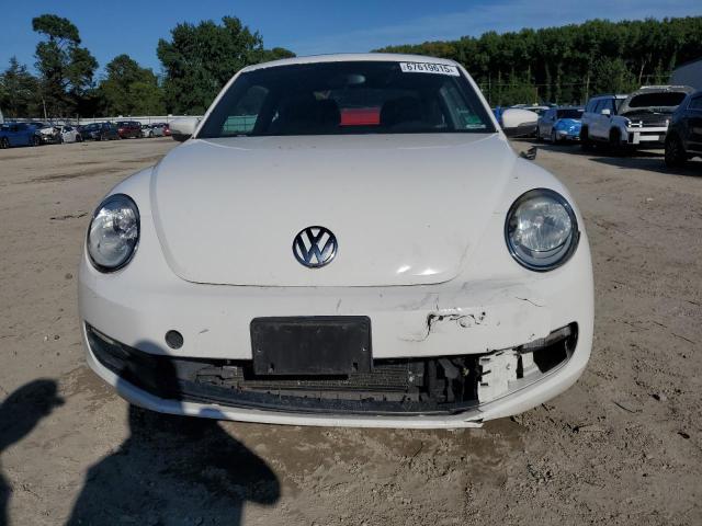 Photo 5 from auction – 2013 VOLKSWAGEN BEETLE with VIN 3VWJP7AT0DM681259