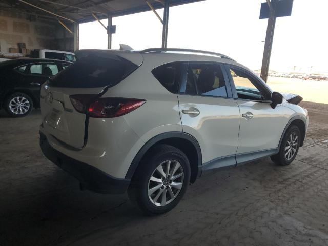 Photo 3 from auction – 2015 MAZDA CX-5 TOURI with VIN JM3KE2CY8F0467237