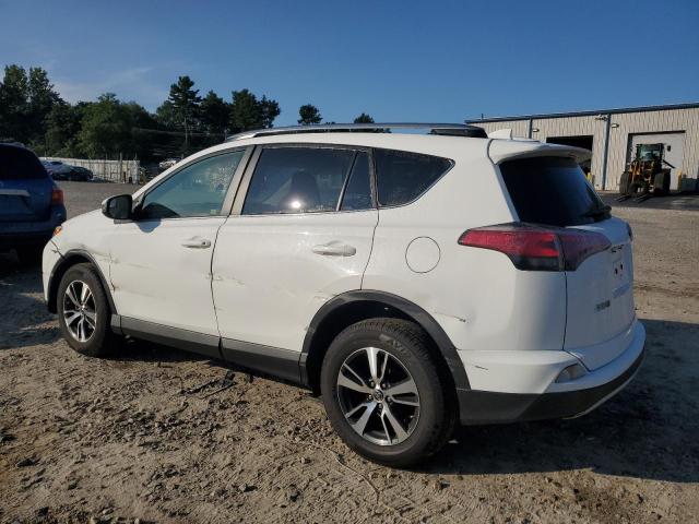 Photo 2 from auction – 2017 TOYOTA RAV4 XLE with VIN JTMRFREV6HD210749