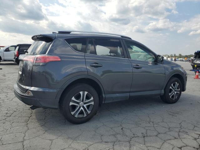 Photo 3 from auction – 2017 TOYOTA RAV4 LE with VIN JTMZFREV9HJ131223