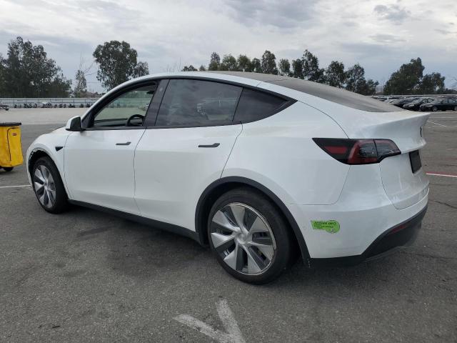 Photo 2 from auction – 2023 TESLA MODEL Y with VIN 7SAYGAEE2PF590760