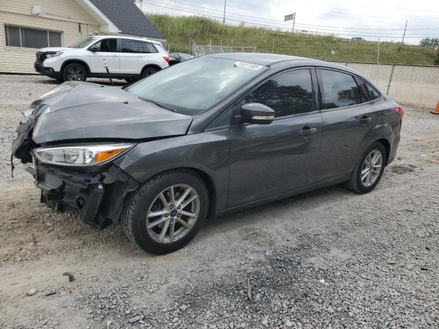FORD FOCUS SE 2017 with VIN 1FADP3F24HL318002 - Photo from auction