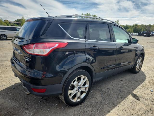 Photo 3 from auction – 2016 FORD ESCAPE TITANIUM with VIN 1FMCU9J9XGUA16496