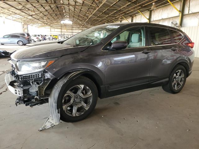 HONDA CR-V EX 2018 with VIN 5J6RW2H57JA000486 - Photo from auction
