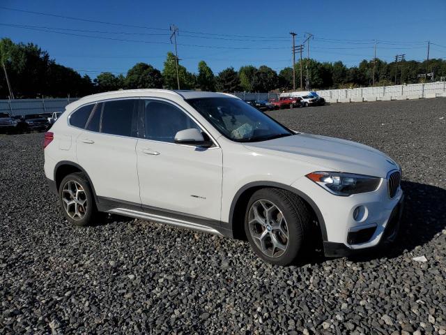 Photo 4 from auction – 2016 BMW X1 XDRIVE2 with VIN WBXHT3C31G5F66821