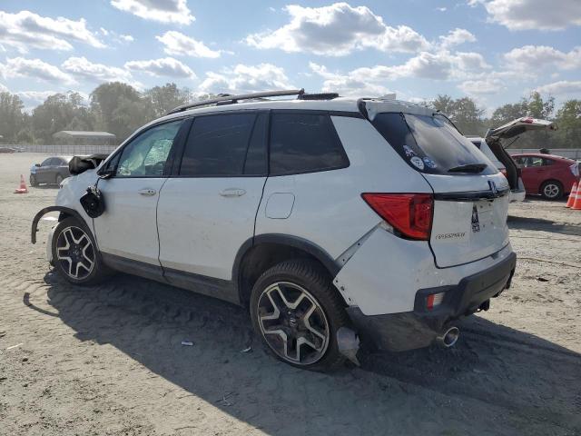 Photo 2 from auction – 2022 HONDA PASSPORT E with VIN 5FNYF8H01NB015670