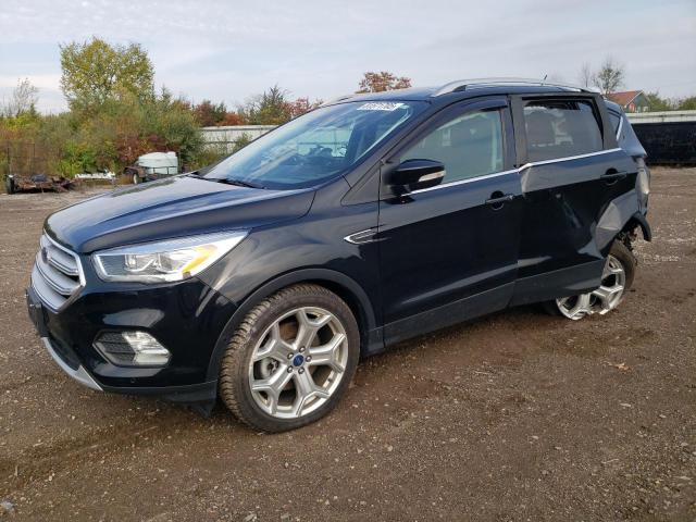 FORD ESCAPE TIT 2018 with VIN 1FMCU9J94JUA19319 - Photo from auction