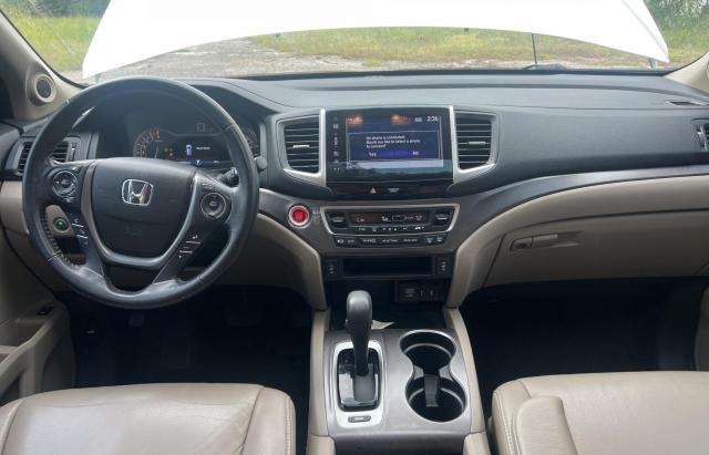 Photo 9 from auction – 2016 HOND PILOT EXL with VIN 5FNYF5H54GB037739