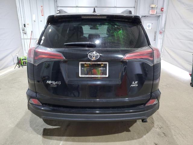 Photo 6 from auction – 2018 TOYOTA RAV4 LE with VIN 2T3BFREV0JW718368