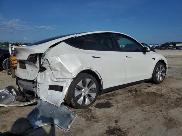 Photo 3 from auction – 2023 TESLA MODEL Y with VIN 7SAYGAEE8PF660164