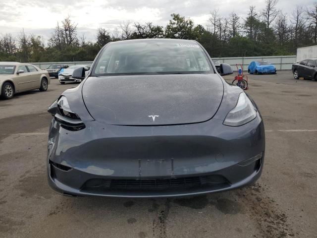 Photo 5 from auction – 2023 TESLA MODEL Y with VIN 7SAYGDEE6PF693505