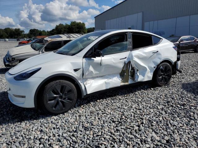 TESLA MODEL Y 2025 with VIN 7SAYGDED3SA378674 - Photo from auction