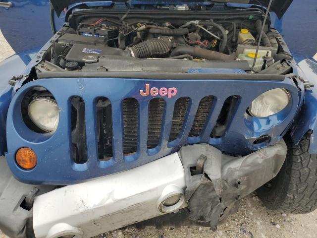Photo 11 from auction – 2010 JEEP WRANGLER U with VIN 1J4BA5H19AL115464