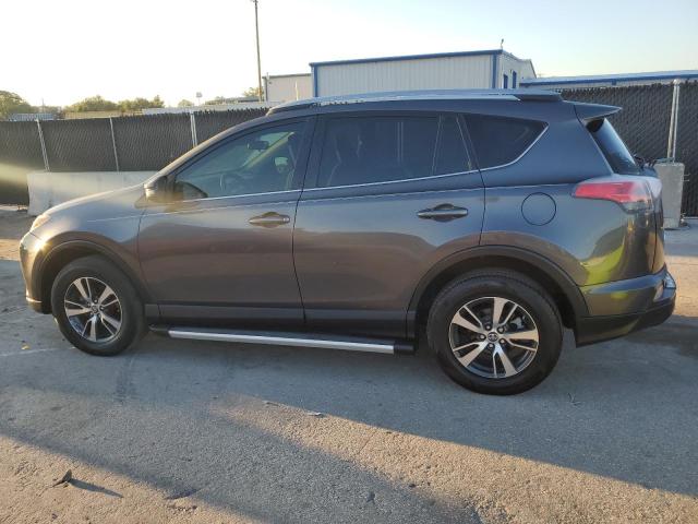 Photo 2 from auction – 2017 TOYOTA RAV4 XLE with VIN JTMWFREV4HJ133433