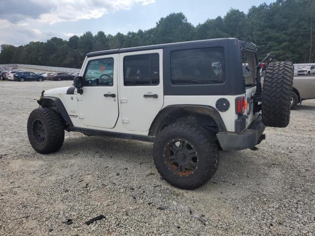 Photo 2 from auction – 2014 JEEP WRANGLER U with VIN 1C4BJWEG4EL234016