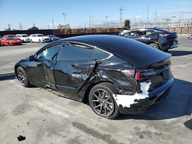 Photo 2 from auction – 2021 TESLA MODEL 3 with VIN 5YJ3E1EA7MF938610