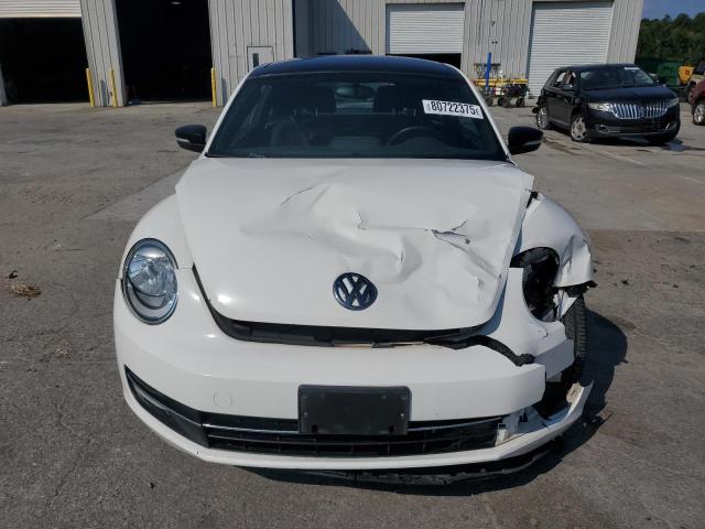 Photo 5 from auction – 2013 VOLKSWAGEN BEETLE TUR with VIN 3VWV67AT8DM608564