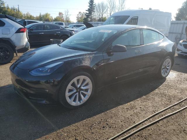TESLA MODEL 3 2022 with VIN 5YJ3E1EB8NF233535 - Photo from auction