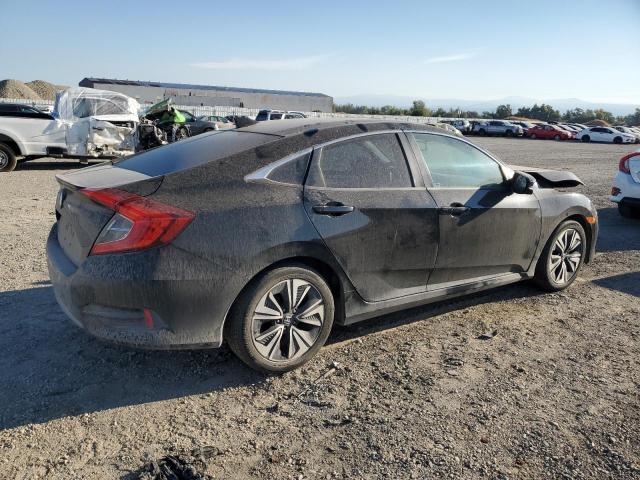 Photo 3 from auction – 2016 HONDA CIVIC with VIN 19XFC1F71GE213908