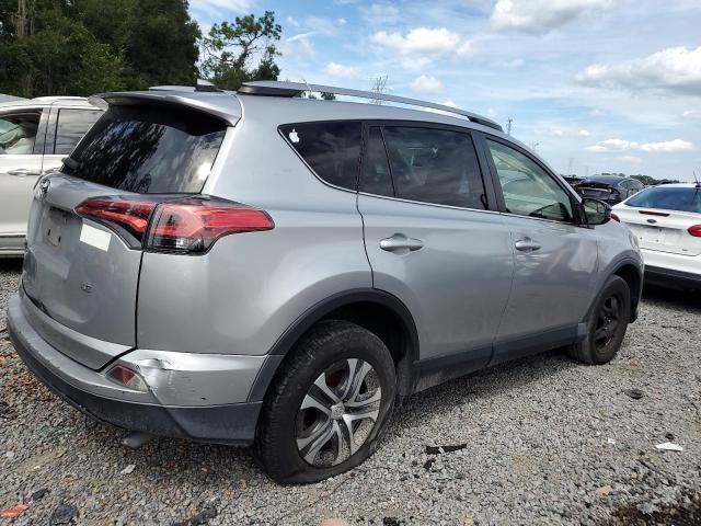 Photo 3 from auction – 2018 TOYOTA RAV4 LE with VIN 2T3ZFREVXJW470645