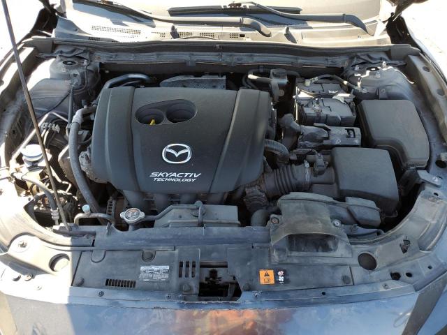 Photo 11 from auction – 2014 MAZDA 3 TOURING with VIN JM1BM1V74E1142443