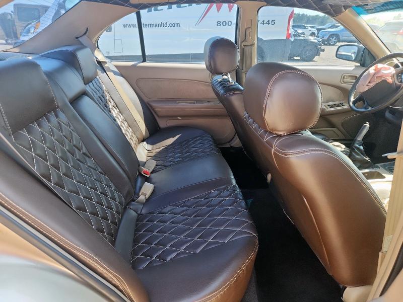 Photo 10 from auction – 1995 NISSAN MAXIMA GLE with VIN JN1CA21D9ST065473