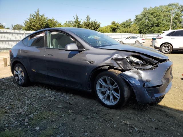 Photo 4 from auction – 2023 TESLA MODEL Y with VIN 7SAYGDED3PF933598