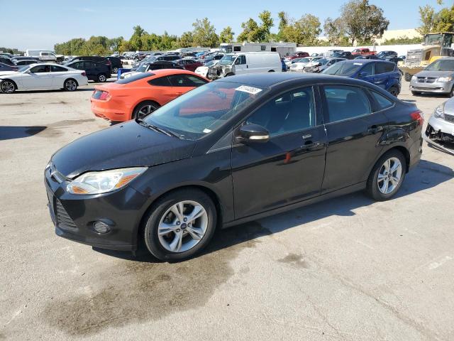 FORD FOCUS SE 2014 with VIN 1FADP3F21EL413127 - Photo from auction