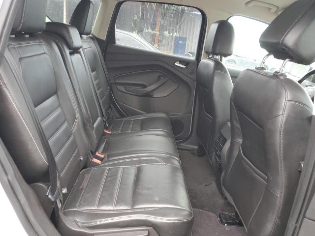 Photo 11 from auction – 2017 FORD ESCAPE SE with VIN 1FMCU9GDXHUC09809