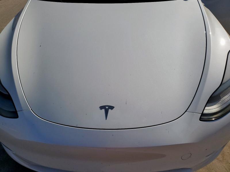 Photo 11 from auction – 2023 TESLA MODEL Y with VIN 7SAYGDEF0PF811881