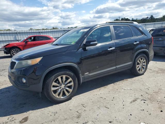 KIA SORENTO EX 2011 with VIN 5XYKUDA23BG054555 - Photo from auction