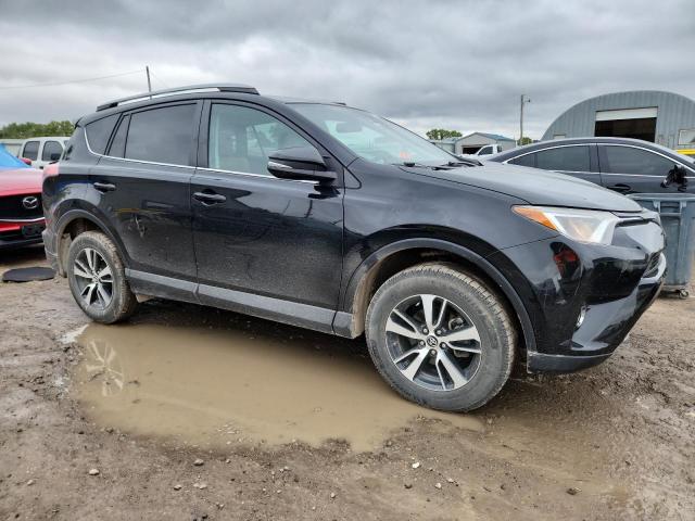 Photo 4 from auction – 2017 TOYOTA RAV4 XLE with VIN 2T3RFREV9HW690112