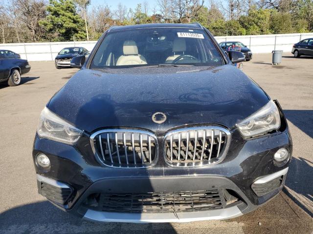 Photo 5 from auction – 2017 BMW X1 XDRIVE2 with VIN WBXHT3Z32H4A57173
