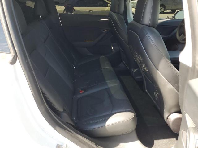 Photo 11 from auction – 2022 TESLA MODEL Y with VIN 7SAYGDEF2NF501101