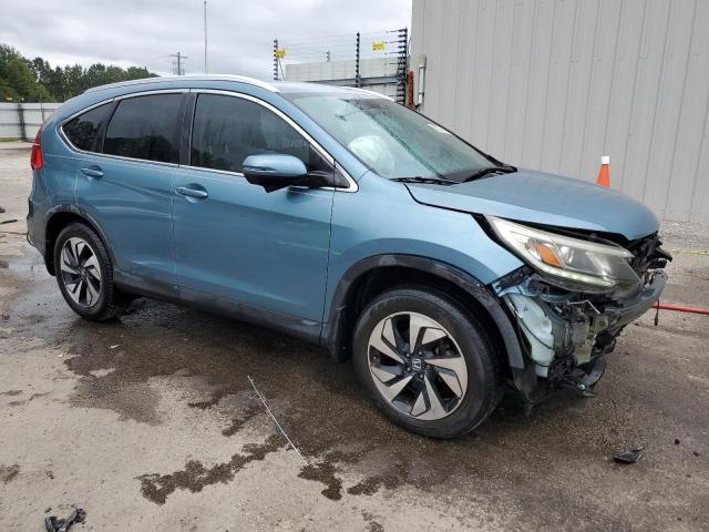 Photo 4 from auction – 2016 HONDA CR-V TOURI with VIN 5J6RM3H95GL018190