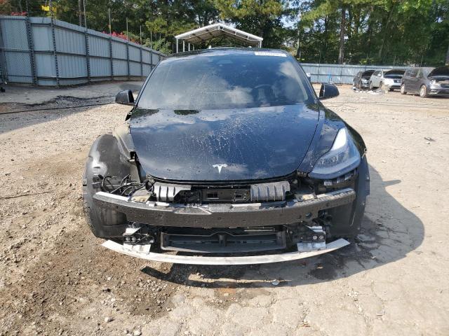 Photo 5 from auction – 2021 TESLA MODEL 3 with VIN 5YJ3E1EB2MF989988
