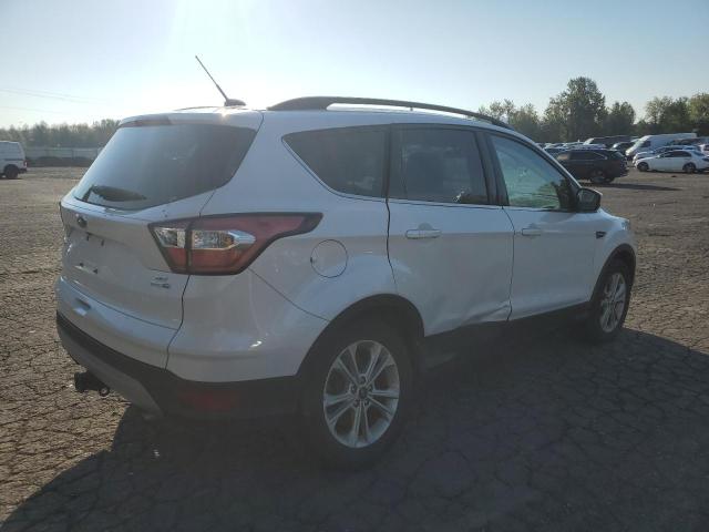 Photo 3 from auction – 2017 FORD ESCAPE SE with VIN 1FMCU9G9XHUB66990